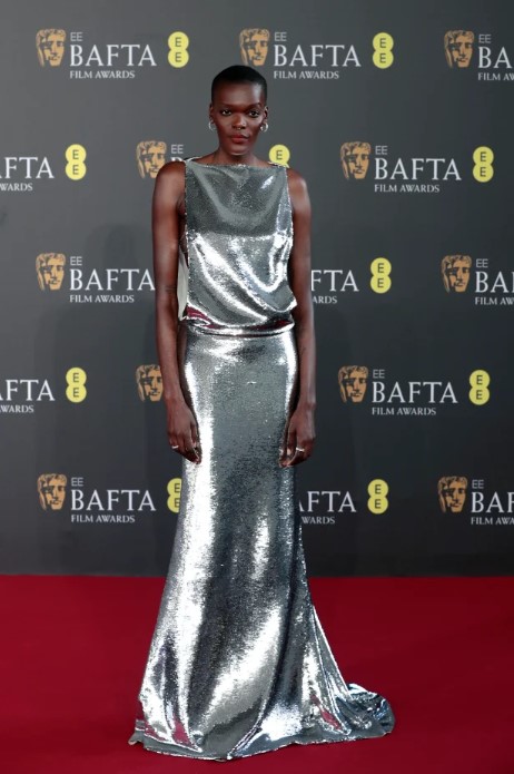 SHEILA ATIM WEARING GUCCI